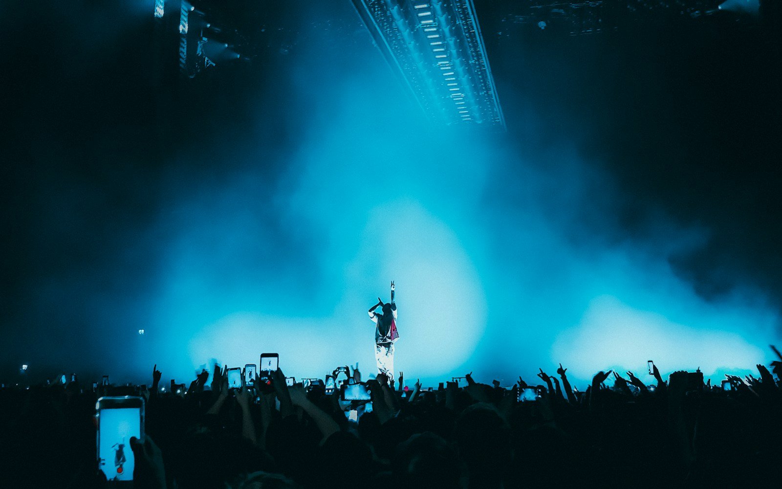 Immersive blue light at a live music performance